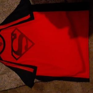 Superman tee jersey material. XL red and black. Superman brand trademark.